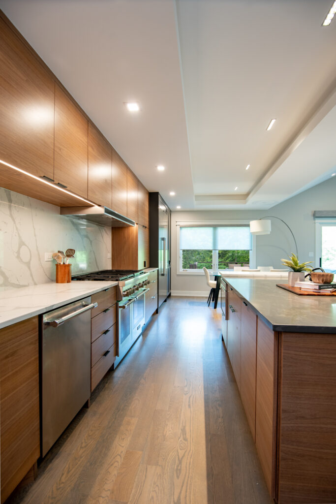 Deerfield Cohesive Contemporary Kitchen Remodel after 2. Photo of the entire remodeled kitchen from the entryway.