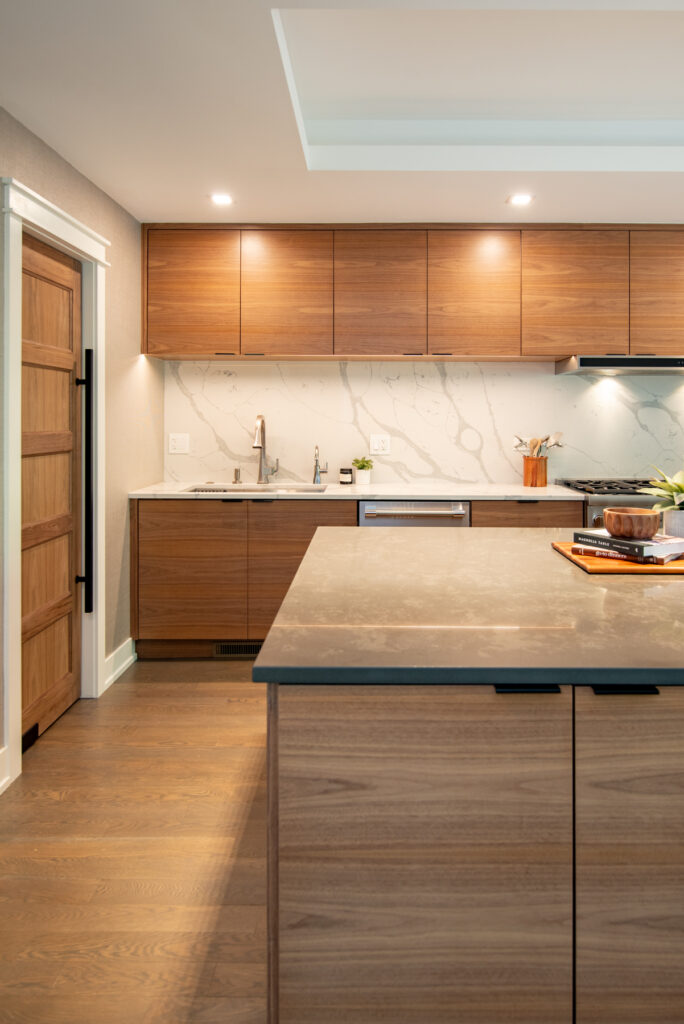 Deerfield Cohesive Contemporary Kitchen Remodel after 6. Photo of the entire remodeled kitchen from behind the kitchen island.