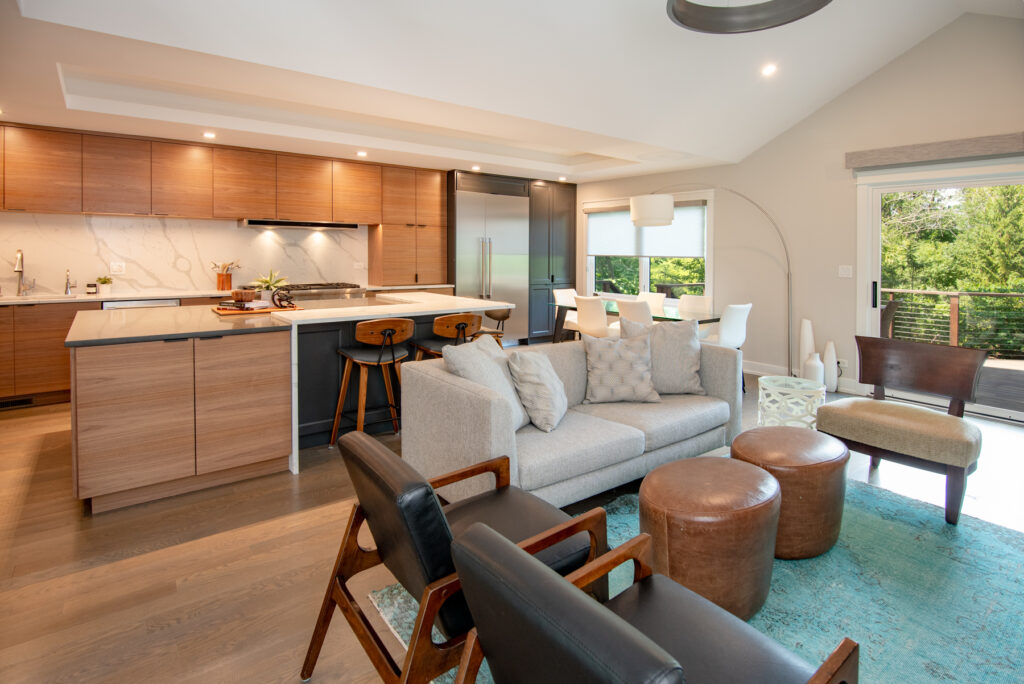 Deerfield Cohesive Contemporary Kitchen Remodel after 8. Photo of the entire remodeled kitchen from the conjoined living room.