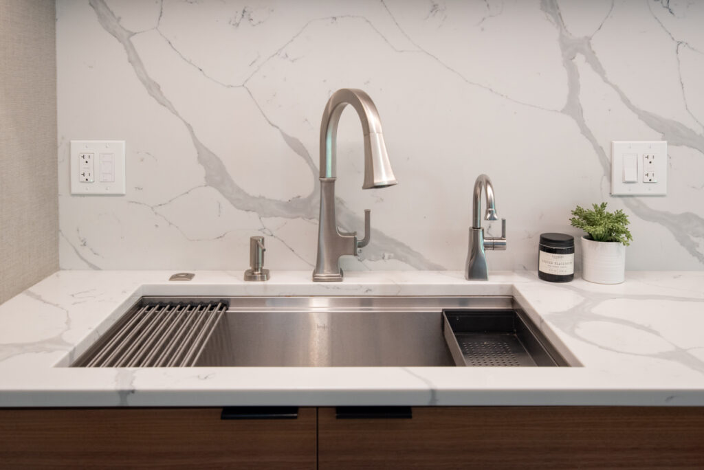 Deerfield Cohesive Contemporary Kitchen Remodel after 22. Photo of the sink.